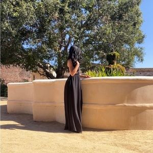 Long dress with breathable material. There is a cut out on the sides and back.